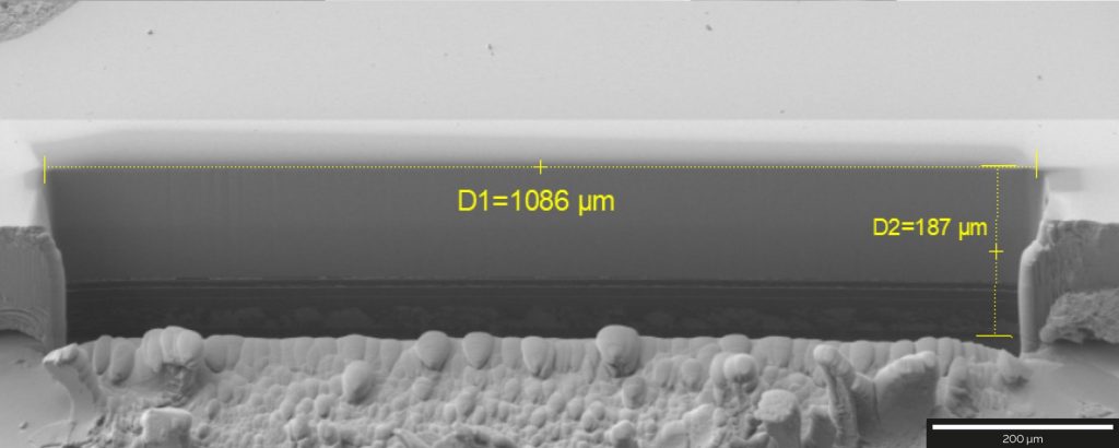 1086 mm-wide cross-section through part of an OLED display, SE detector at 2 kV