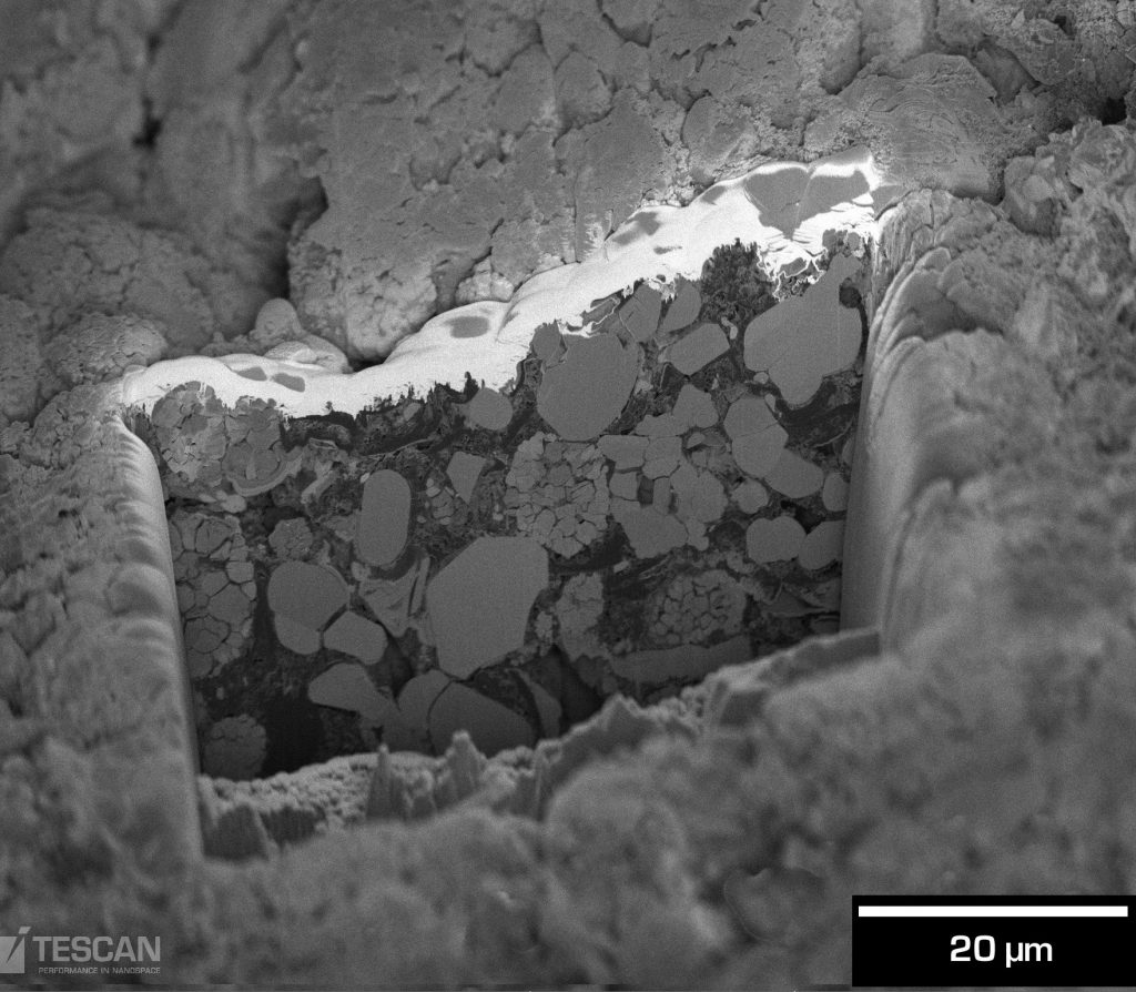 50-μm long cross-section prepared with Orage™, the new Ga FIB column in TESCAN S8000G enabling current ion beams up to 100 nA.